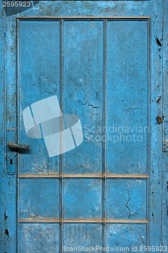 Image of Closeup of a blue wooden door