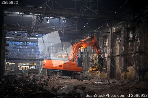 Image of Industrial interior with bulldozer inside
