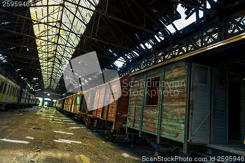 Image of Cargo trains in old train depot