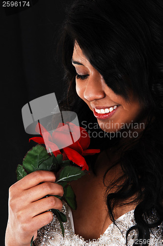Image of Bride with red roses.