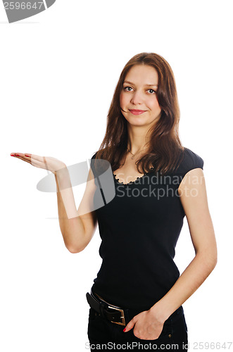 Image of Portrait of pretty young woman holding her hands out and present