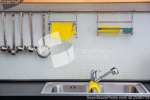 Image of Clean dishwasher at the kitchen