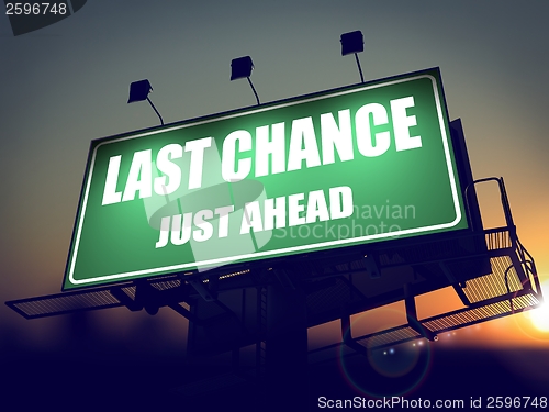 Image of Last Chance Just Ahead on Green Billboard.