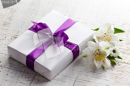 Image of gift box and flowers