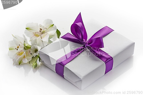 Image of gift box and flowers