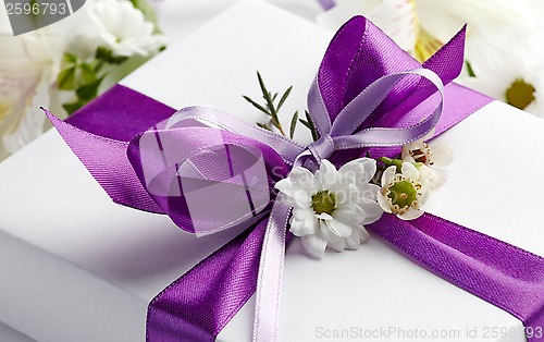 Image of closeup of gift box bow