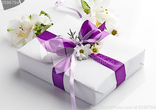 Image of gift box and flowers
