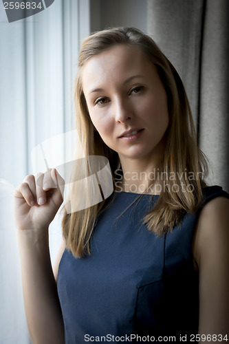 Image of woman at window