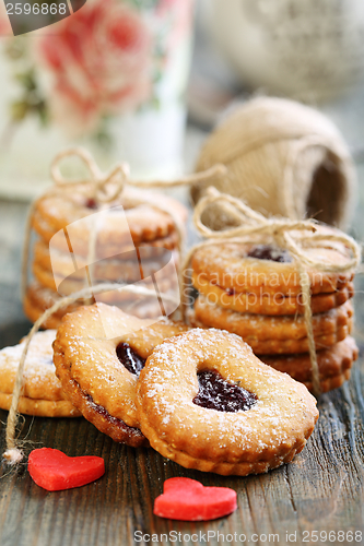 Image of Biscuits and marzipan red hearts.