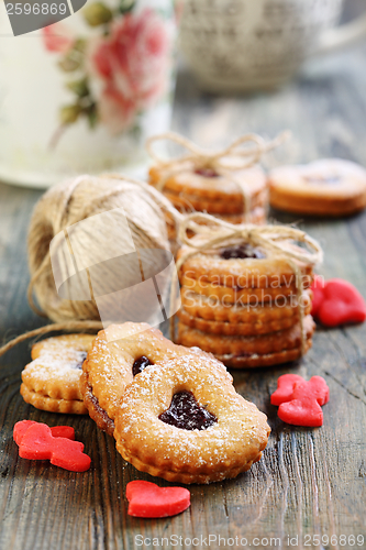 Image of  Red hearts marzipan and Linzer Cookie. 