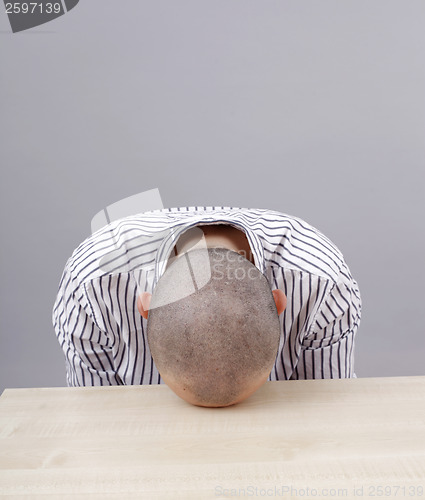 Image of Man at desk