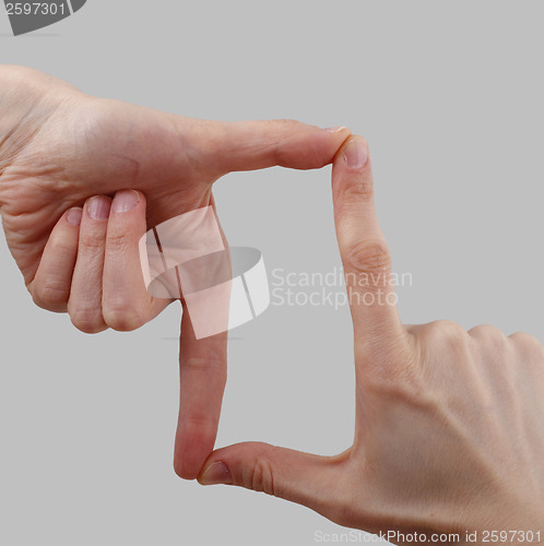 Image of White hand on perfect gray background