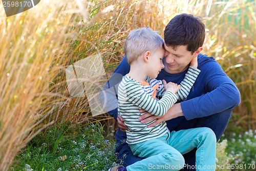 Image of family outside