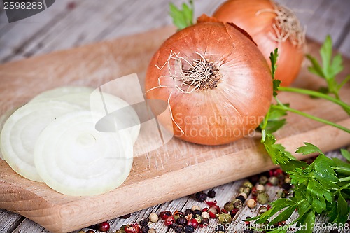 Image of fresh onions, parsley and peppercorns