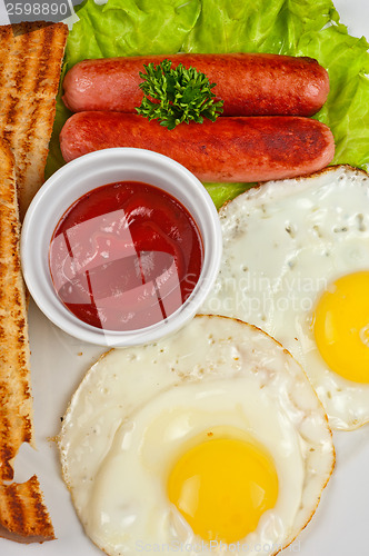 Image of Fried eggs with sausages