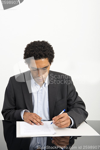 Image of Lawyer reading a contract