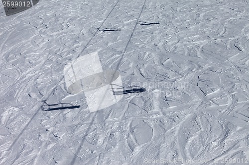 Image of Shadows from chair lift on off-piste slope