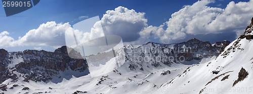 Image of Panorama of snow mountains in spring