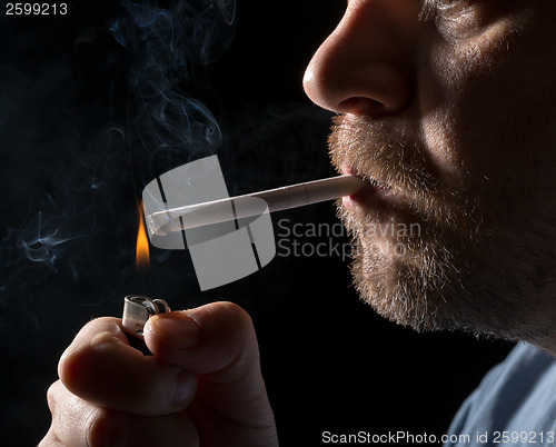 Image of Portrait man smoking cigarette