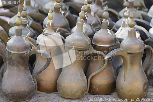 Image of Old coffee pots in Doha souq