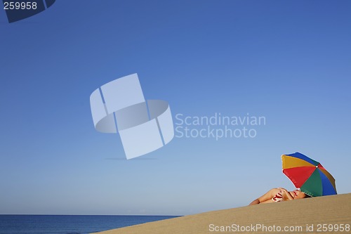 Image of Woman under Parasol