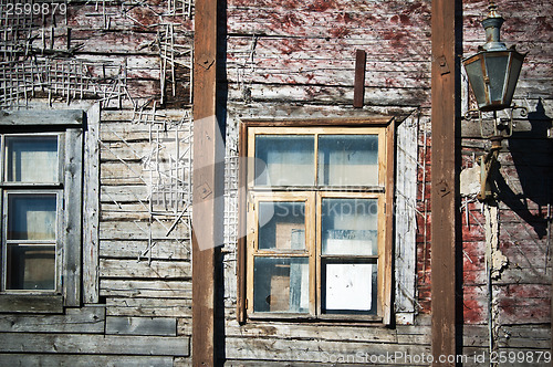 Image of Wall of the old wooden house requiring restoration, close up