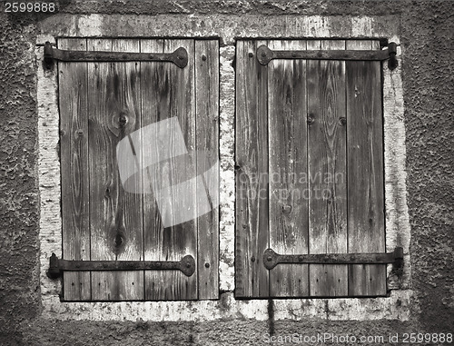 Image of Old window shutters, a black and white photo 