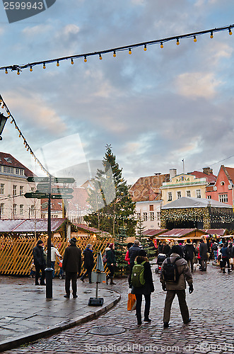 Image of TALLINN, ESTONIA — DECEMBER 01: People enjoy Christmas market in Tallinn on December 01, 2013 in Tallinn , Estonia. It is Estonia oldest Christmas Market with a very long history dating back to 1441