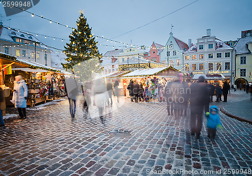 Image of TALLINN, ESTONIA — DECEMBER 08: People enjoy Christmas market 