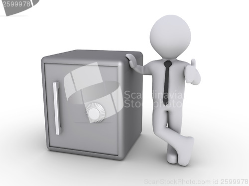 Image of Happy businessman with safe