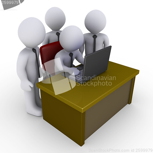 Image of Businessmen in office looking at laptop