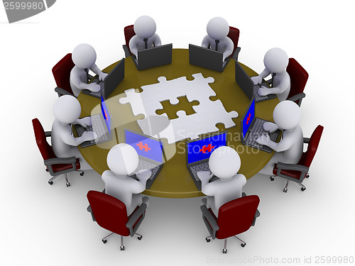 Image of Businessmen around table searching for solution