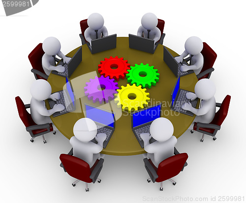Image of Businessmen around table with laptops and four cogs