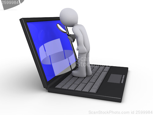 Image of Person with magnifier on laptop