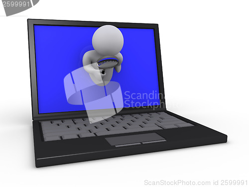 Image of Person with magnifier through laptop