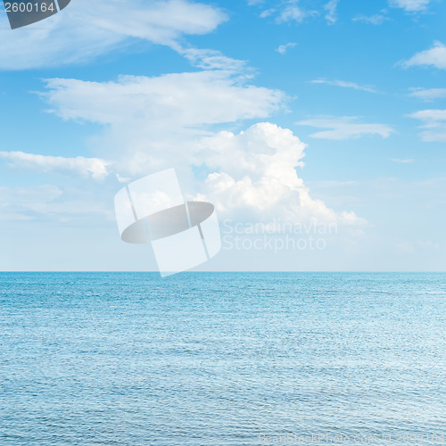 Image of blue sea and cloudy over it