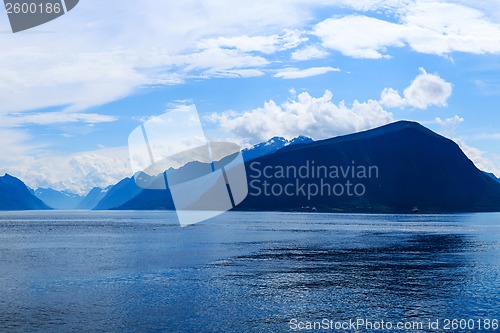 Image of Mountains and fjord in the late afternoon