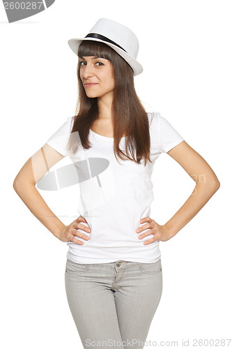 Image of Stylish casual young woman posing with a hat