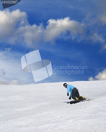 Image of Snowboarder on ski slope