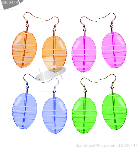 Image of Earrings made of glass on a white background. Four pairs