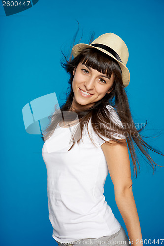 Image of Smiling carefree woman wearing white straw hat