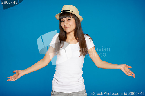 Image of Shrugging woman in doubt