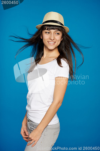 Image of Smiling carefree woman wearing white straw hat