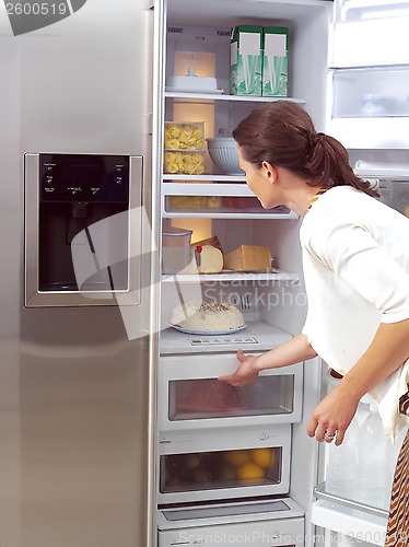 Image of woman looking for something to eat