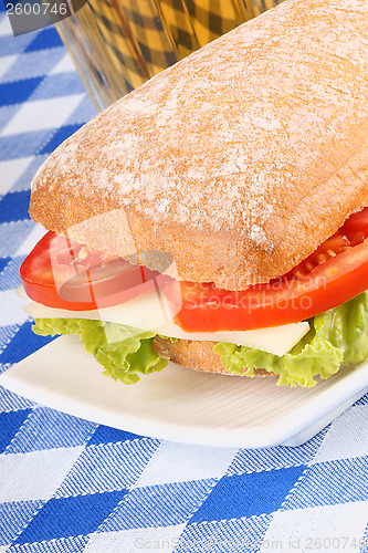 Image of Italian panino (sandwich) and beer