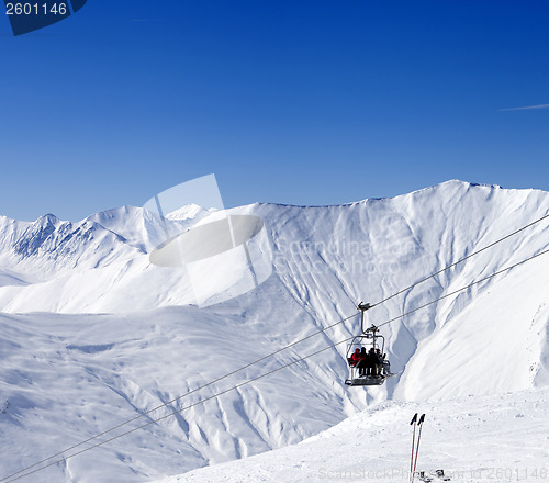 Image of Skiers on ropeway at ski resort Gudauri