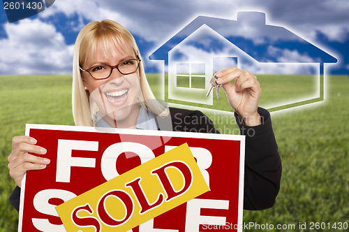 Image of Woman with Sold For Sale Sign, Keys and Ghosted House