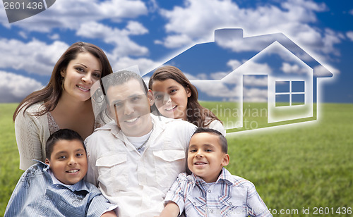 Image of Hispanic Family Sitting in Grass Field with Ghosted House Behind