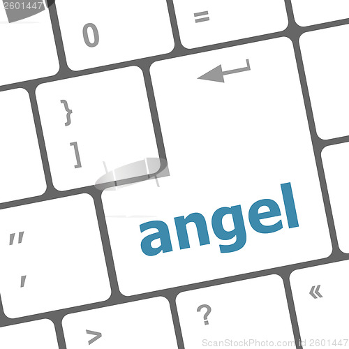 Image of Keyboard with white Enter button, angel word on it