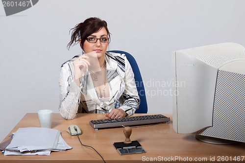 Image of Young female office worker